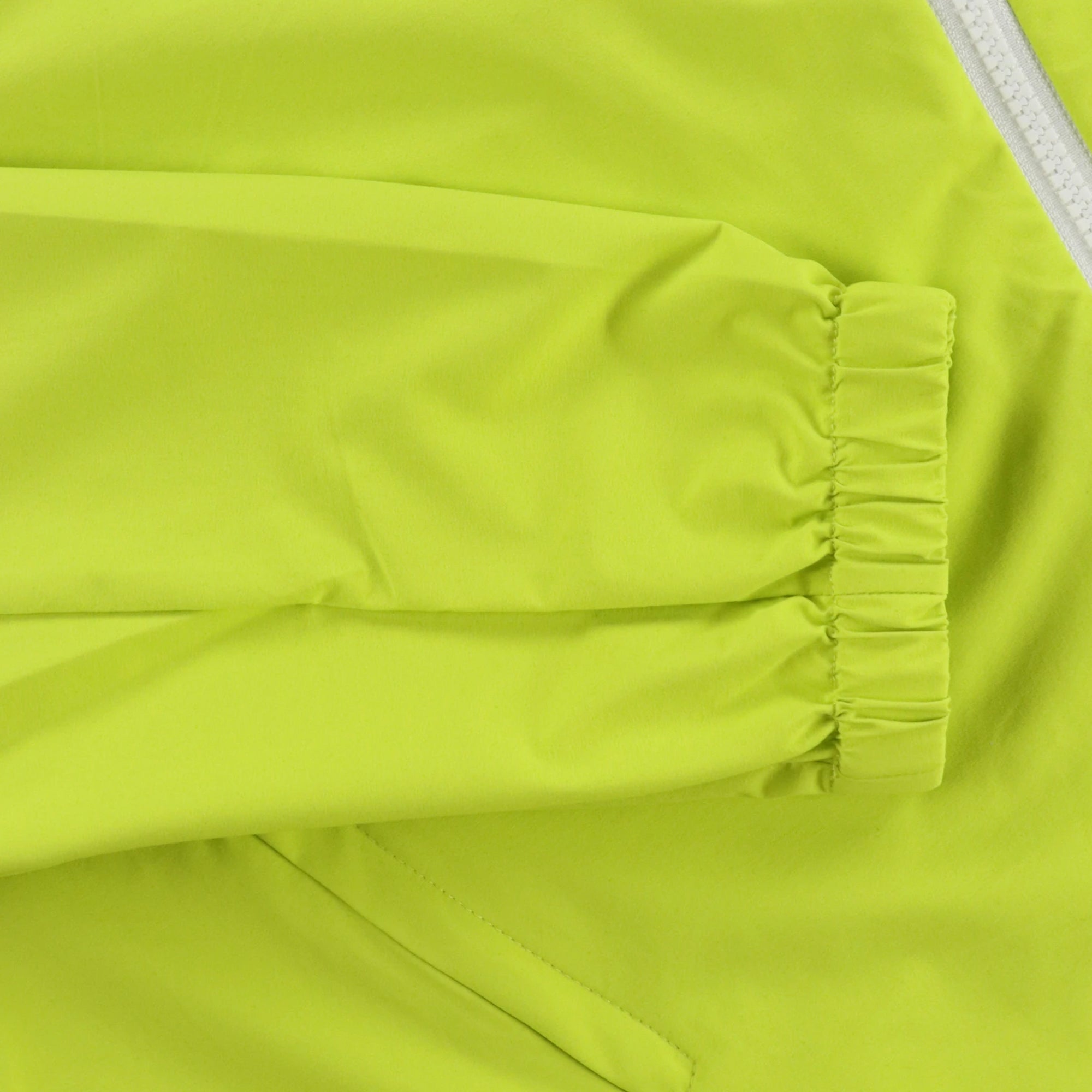 WOMEN 2.5層ラミネートストレッチタフタ アウター ライムイエロー