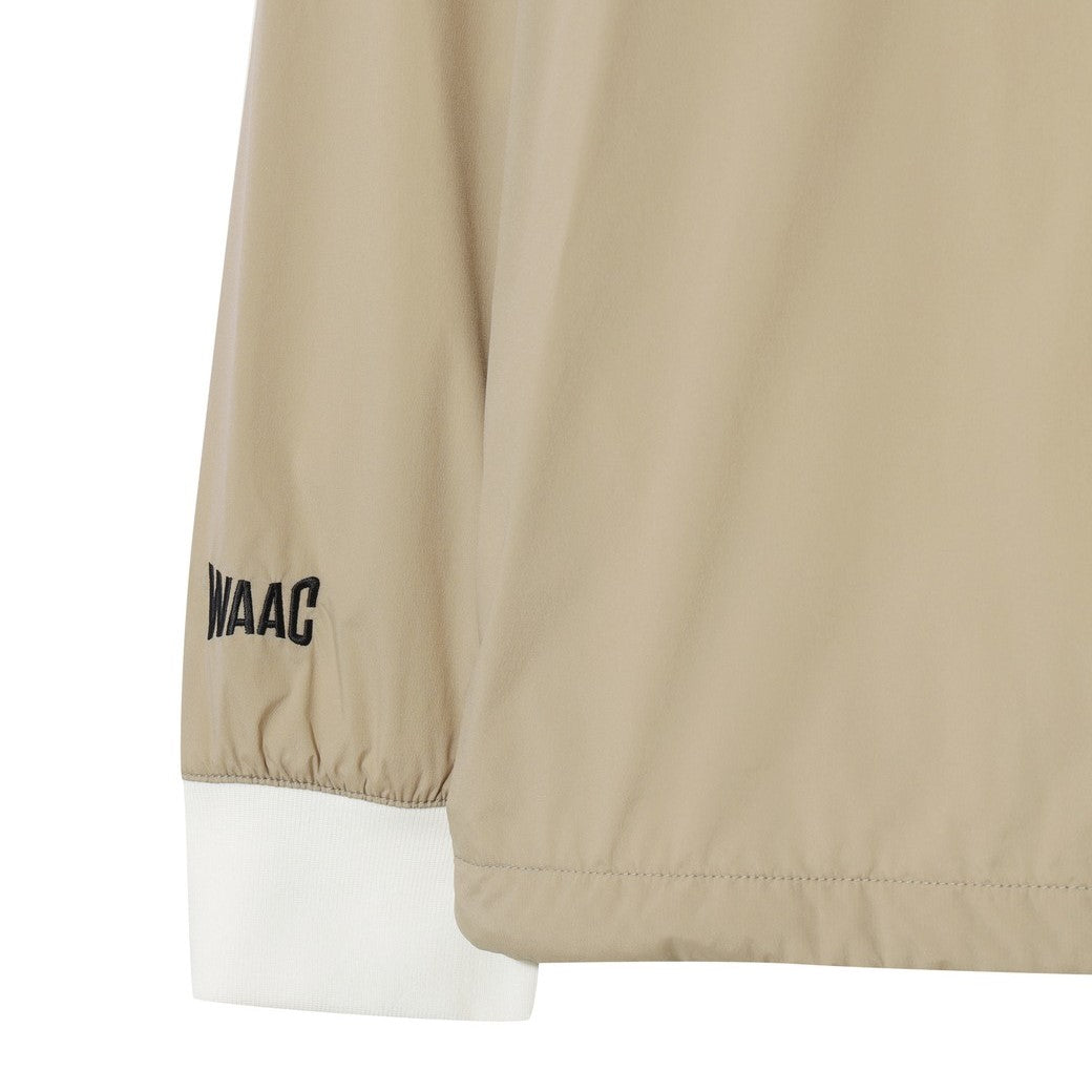 【WAAC X JONES】MEN ロゴウィンドブレーカープルオーバー ベージュ